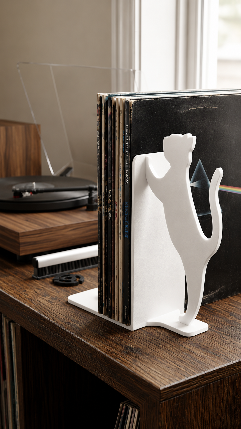 White cat silhouette record bookend for vinyl collections.