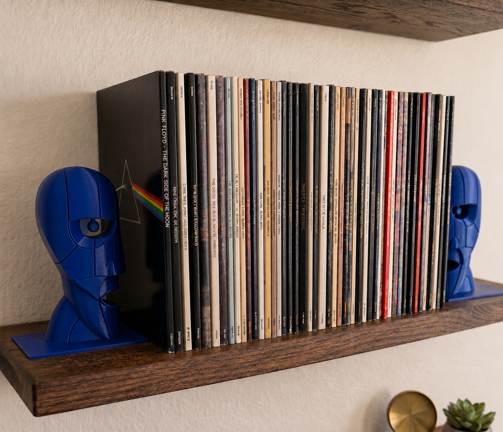 Blue Division Bell inspired 3D printed vinyl record bookends on a wooden shelf.